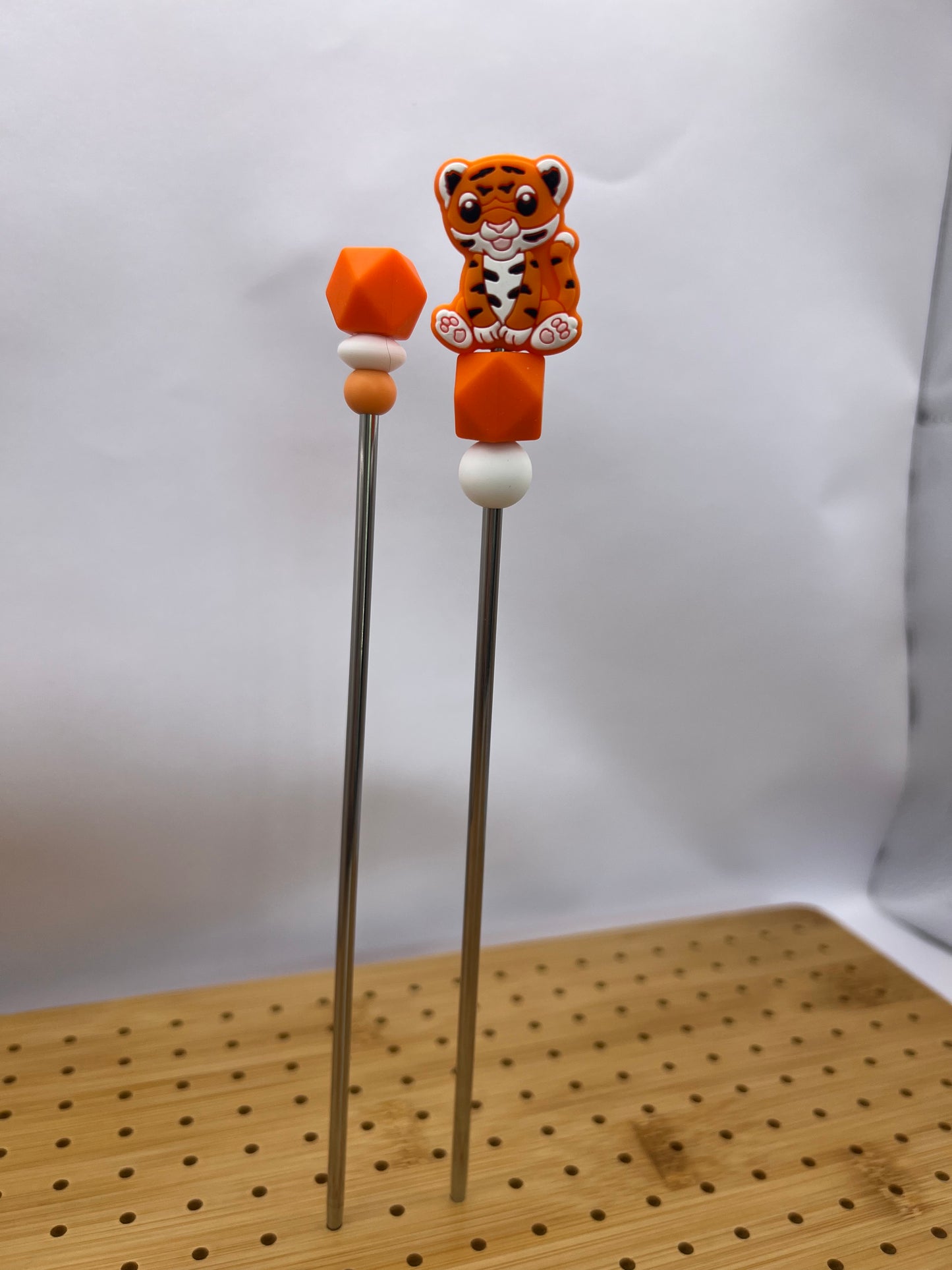 Orange tiger amigurumi sticks
