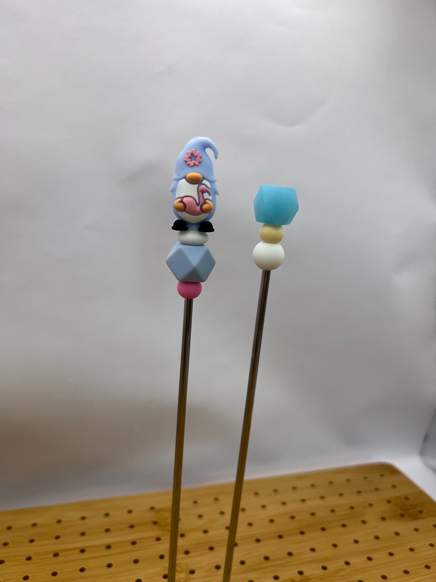 blue gnome with flamingo amigurumi sticks