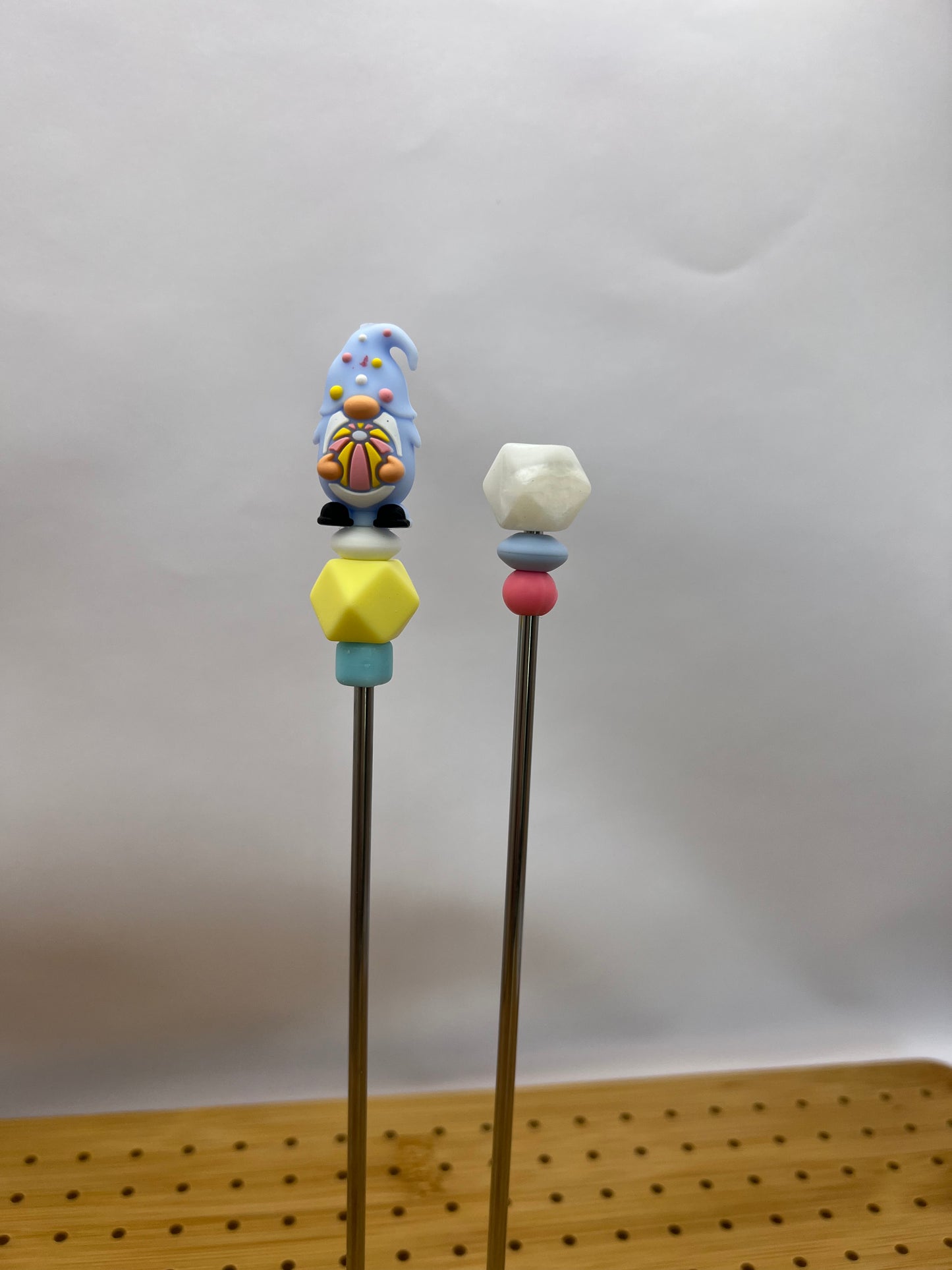 Blue gnome with beach ball amigurumi sticks
