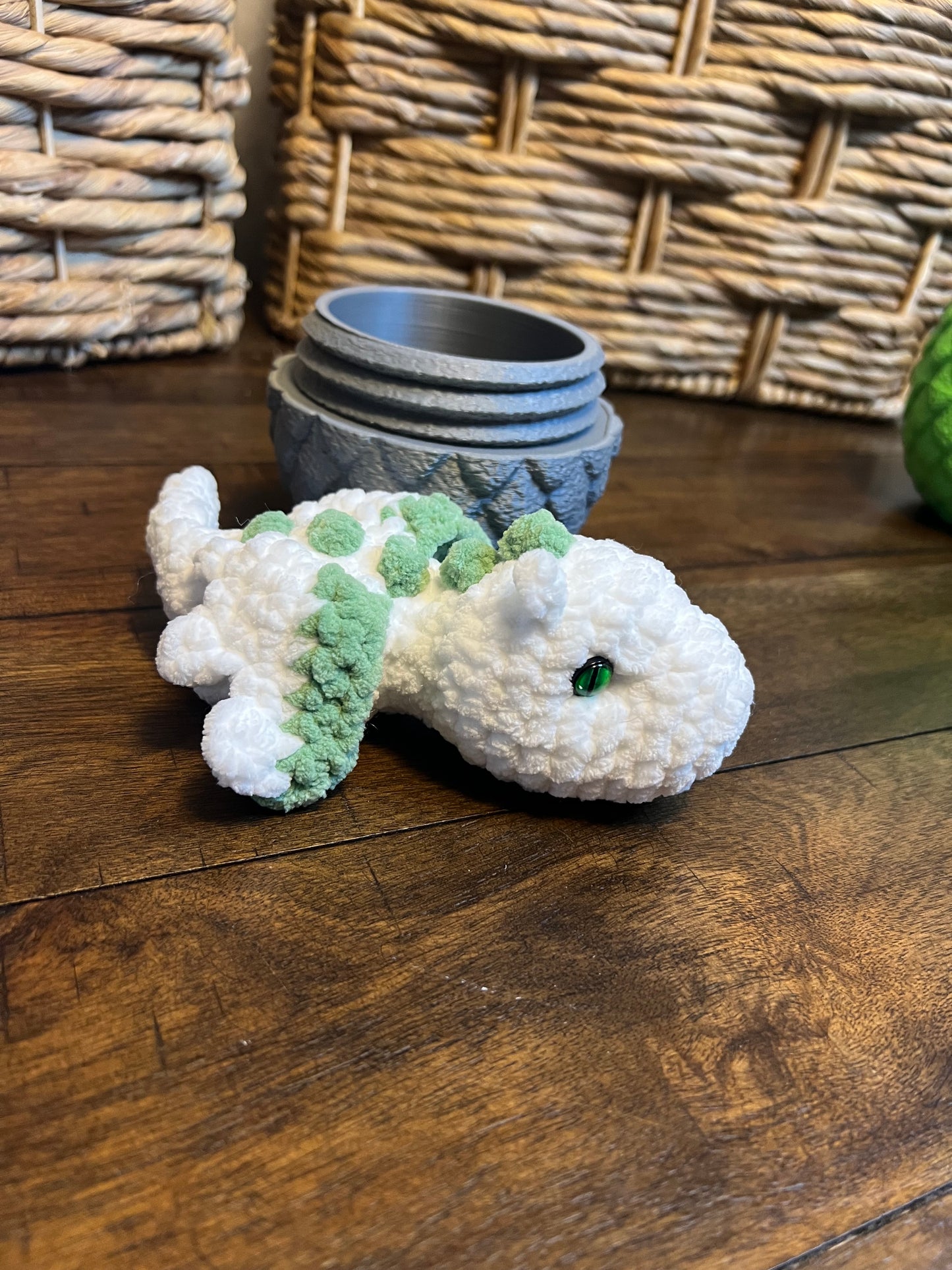 Gray dragon egg with white baby dragon