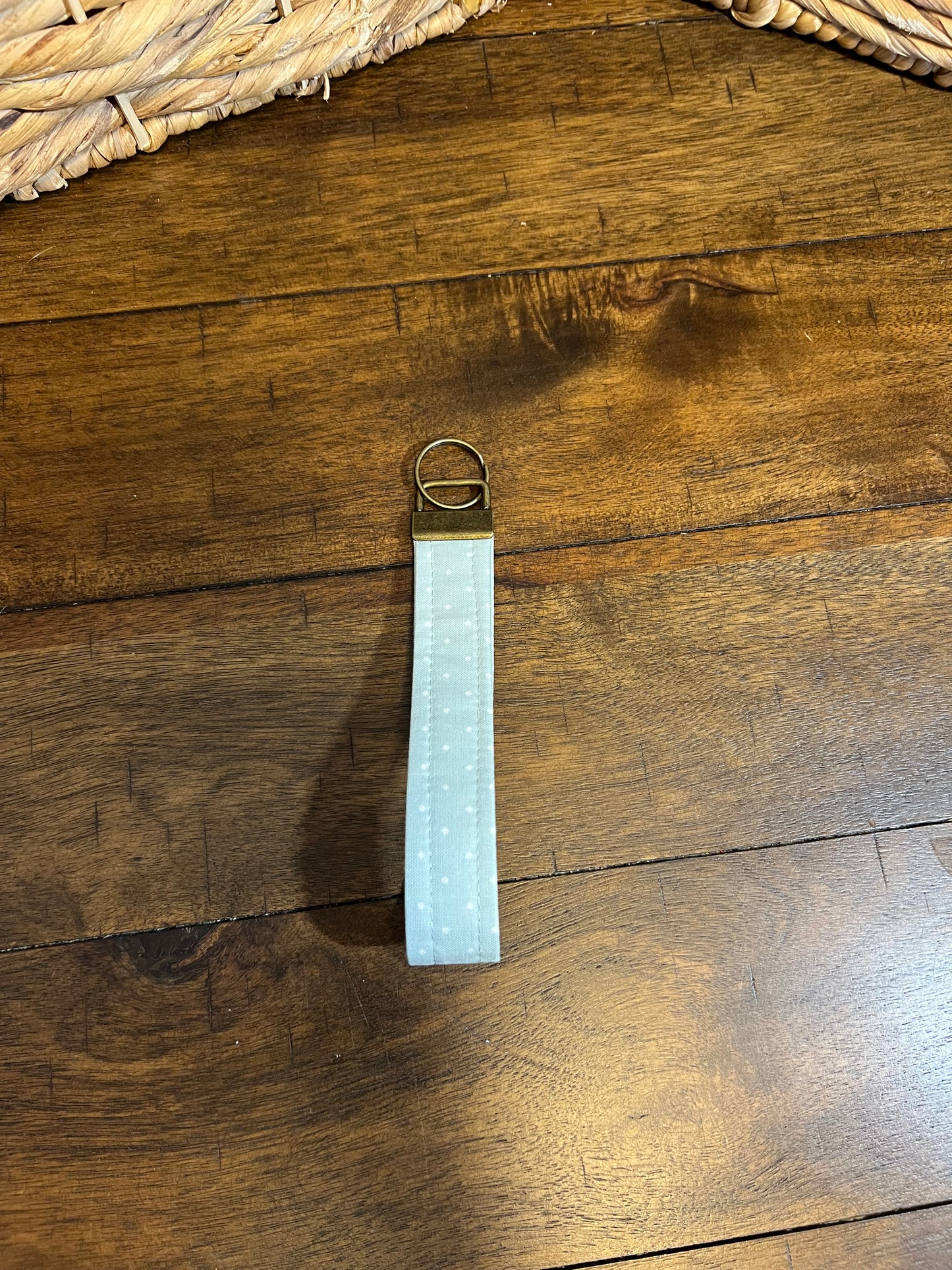 Wristlet Pale blue with white polka dots