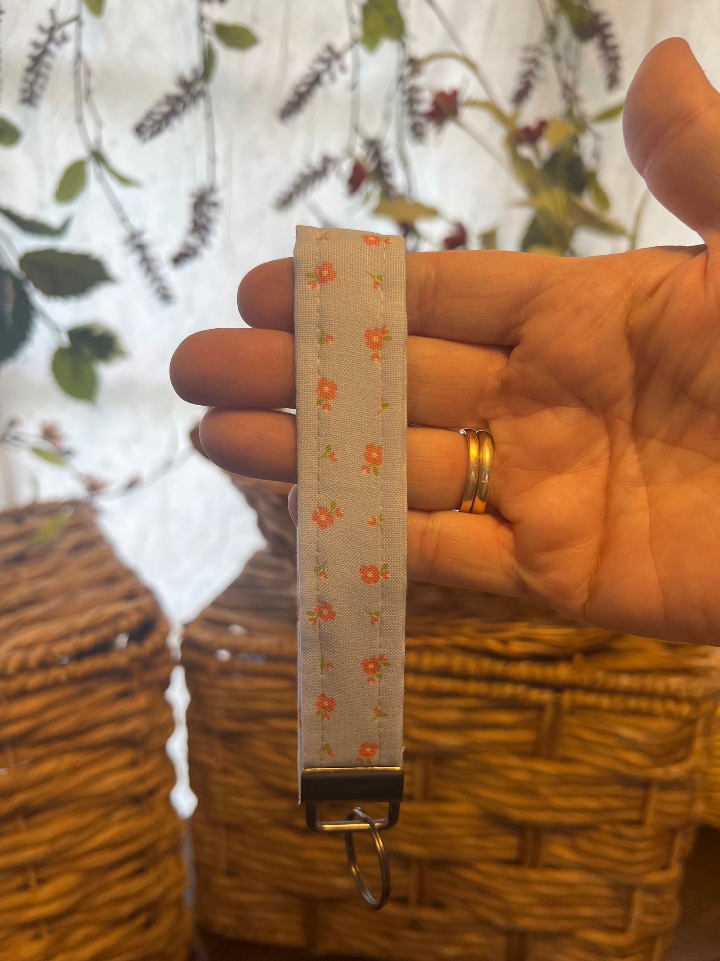 Wristlet Blue with coral flower print